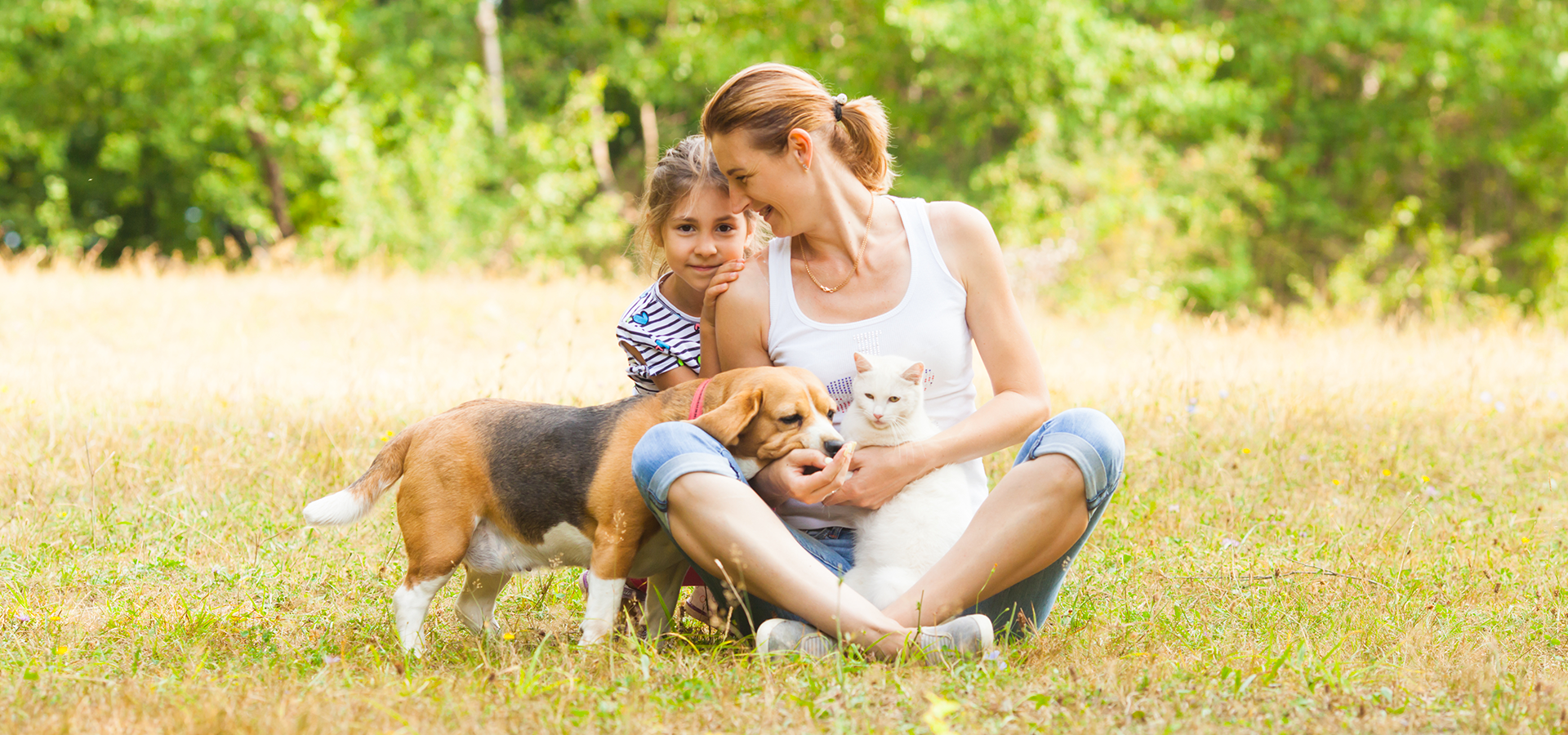 Family with dog and cat